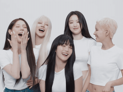 Group Of Young Women Posing One Laughing GIF