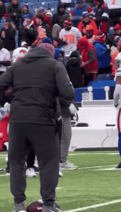 Group On Football Field With Man In Number 78 Shirt GIF