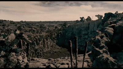 Group On Rocky Cliff Overlooking River GIF