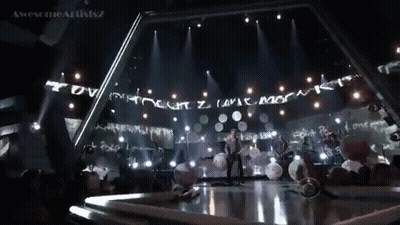 Group on Stage Saying Awesome Artists