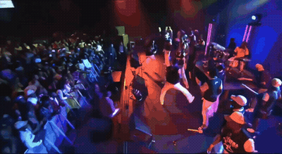 Group On Stage With Fox News Screen GIF