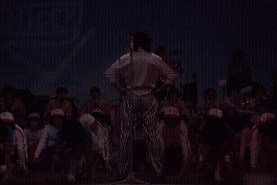 Group On Stage With Hideki Sign GIF