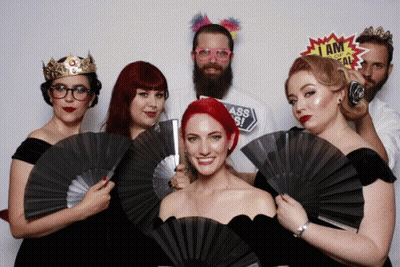 Group Photo With I Am A Freak Sign GIF