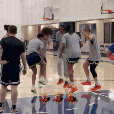 Group Playing Basketball On Court GIF