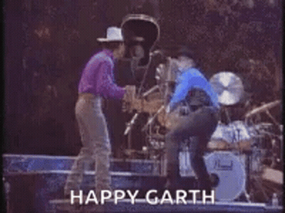 Group Playing Drums In Dark Room Happy Garth GIF