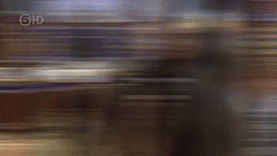 Group Playing In Living Room With BB Sign GIF