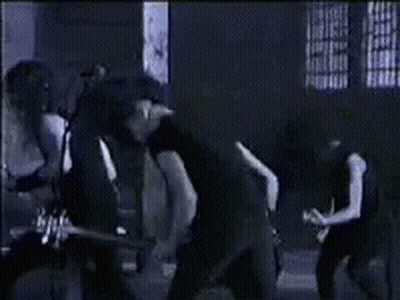 Group Playing Instruments In Dark Room GIF