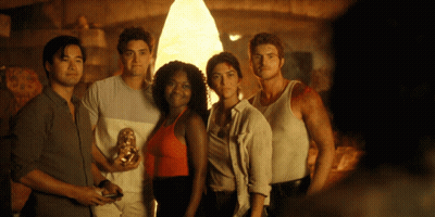 Group Posing For Picture In Front Of Light GIF