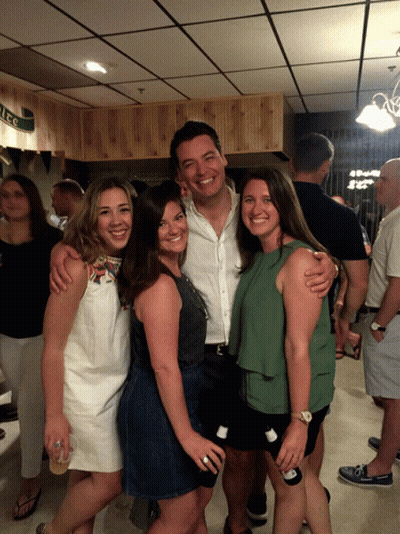 Group Posing For Picture With Ice Sign GIF