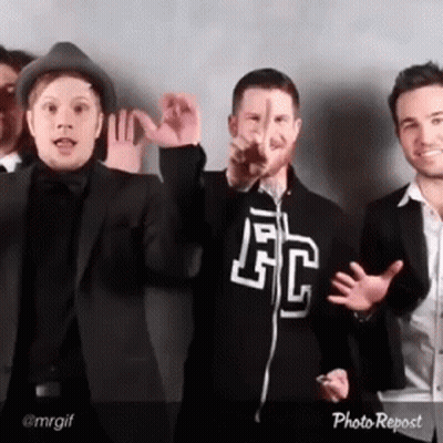 Group Posing With FC Sweatshirt GIF