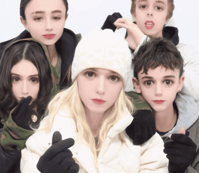 Group Posing With Girl In White Hat GIF