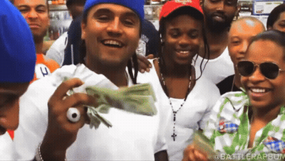 Group Posing With Stack Of Money GIF