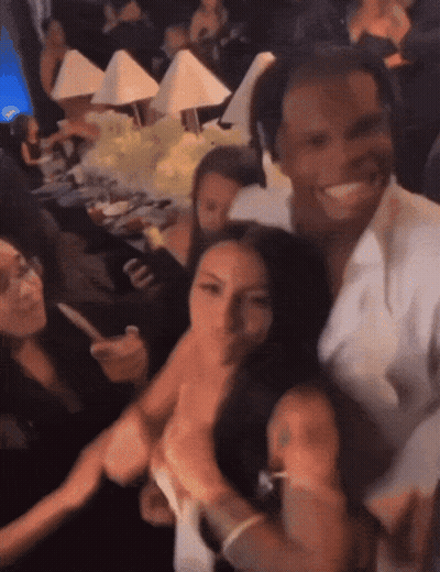 Group Posing With White Shirt Saying A GIF