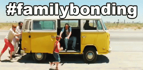 Group Pushing Yellow Van With Family Bonding GIF