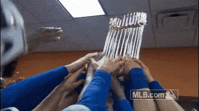 Group Putting Hands Together In Front Of MLB.com Logo GIF