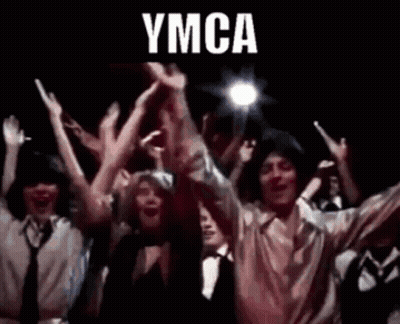Group Raising Arms With YMCA GIF