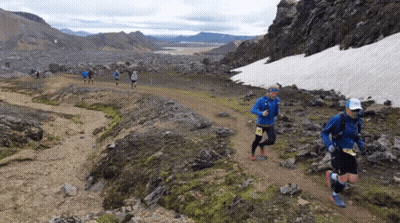 Group Running On Trail With Salomon Tag GIF