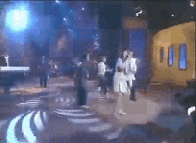 Group Singing On Stage With Piano GIF