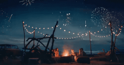 Group Sitting Around Campfire Buon Ferragosto GIF
