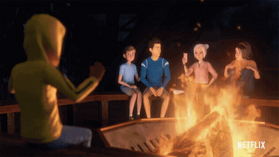 Group Sitting Around Fire With Netflix GIF