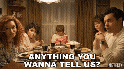 Group Sitting Around Table Saying Anything You Wanna Tell Us GIF