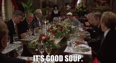 Group Sitting Around Table Saying It's Good Soup GIF