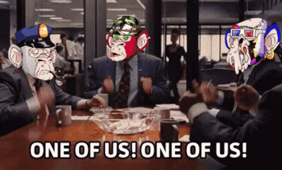Group Sitting Around Table Saying One Of Us One Of Us GIF