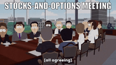 Group Sitting Around Table Stocks And Options Meeting GIF