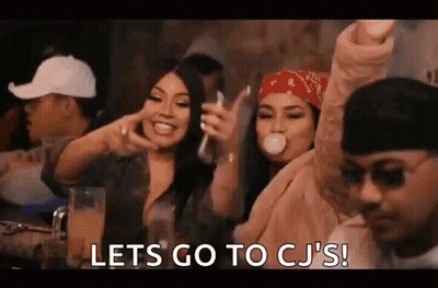 Group Sitting At Bar Table GIF