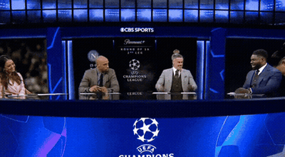 Group Sitting At Champions League Logo GIF