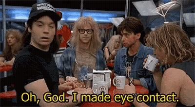 Group Sitting At Diner Table Talking GIF