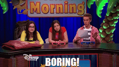 Group Sitting At Table In Front Of Morning Sign GIF