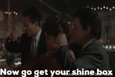 Group Sitting At Table Now Go Get Your Shine Box GIF