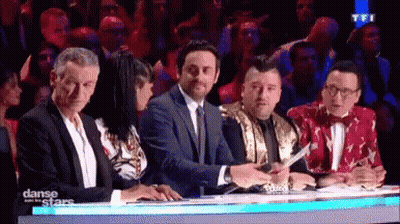 Group Sitting At Table Watching Dance Show GIF