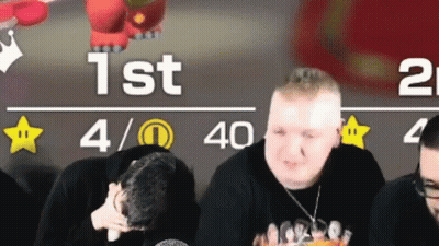 Group Sitting In Front Of 1St And 2Nd Sign GIF