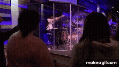 Group Sitting In Front Of Drum Set GIF