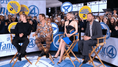Group Sitting In Front Of Good Morning America Sign GIF