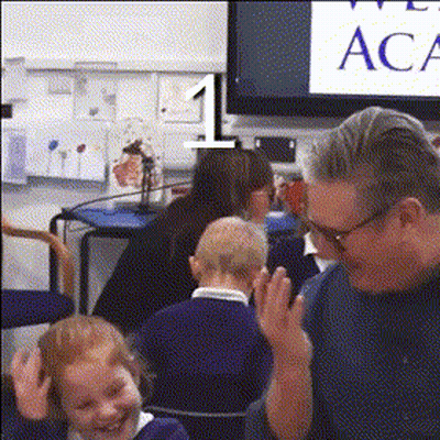 Group Sitting In Front Of Screen Saying ACA GIF