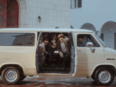 Group Sitting In Van With Doors Open GIF