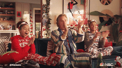 Group Sitting On Couch With Hands In Air NBC Logo GIF