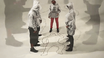 Group Standing Around Body Drawing With 17 And Injured Hoodie GIF