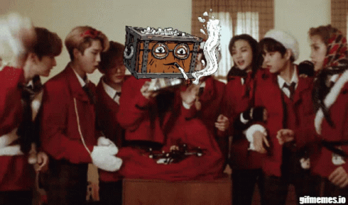 Group Standing Around Box With Cartoon Face GIF