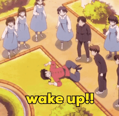 Group Standing Around Man Laying On Ground Saying Wake Up GIF