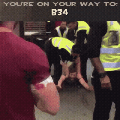 Group Standing Around Man Saying You're On Your Way To B34