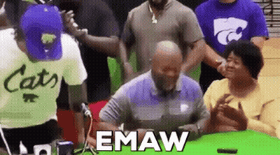 Group Standing Around Man Signing Document GIF