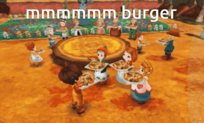 Group Standing Around Table Holding Pizza Saying Mmmmm Burger GIF