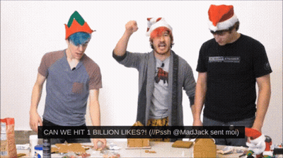Group Standing Around Table Saying Can We Hit 1 Billion Likes GIF