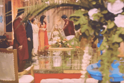 Group Standing Around Table With Flowers And HD Sign GIF