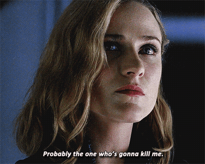 Group Standing Around Table With Number 4 GIF