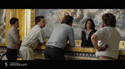 Group Standing At Counter With Movieclips GIF